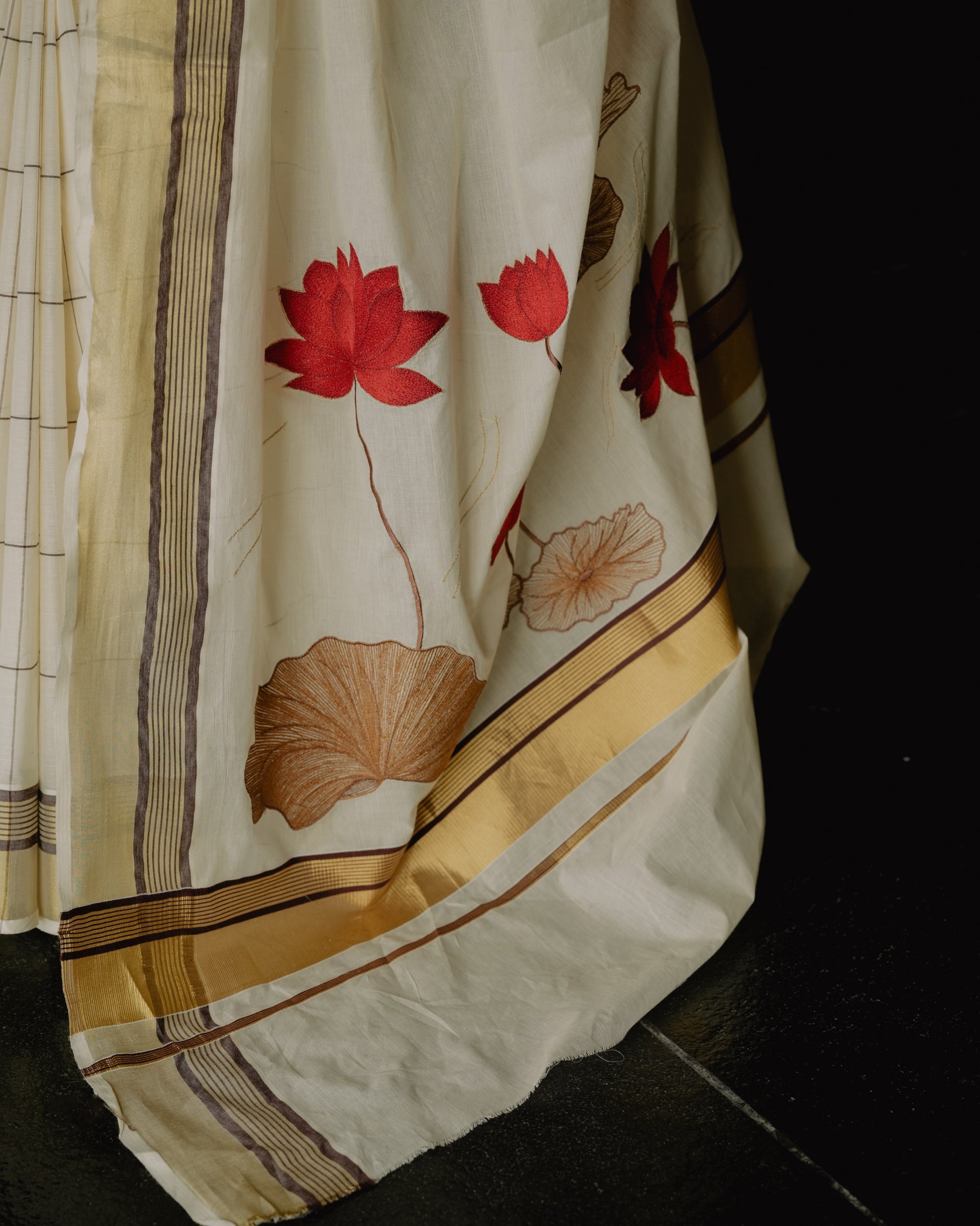Pure Kerala Checkered Saree with embroidered pallu